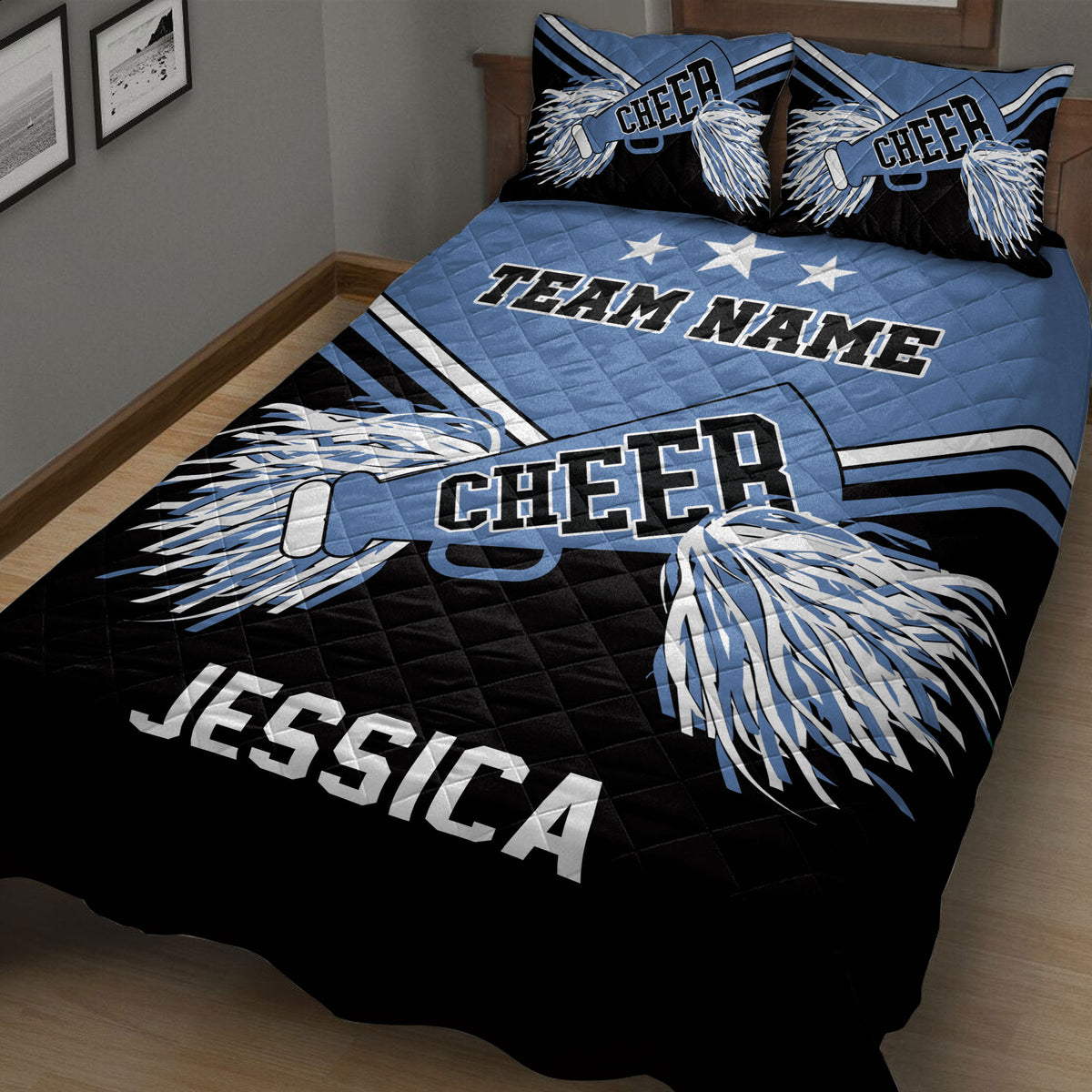 Blue cheerleading quilt blanket shown in a bedroom with pom-pom graphics and coordinated pillow artwork