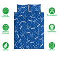 Blue hockey quilt bedding set shown with quilted surface and lifestyle feature icons
