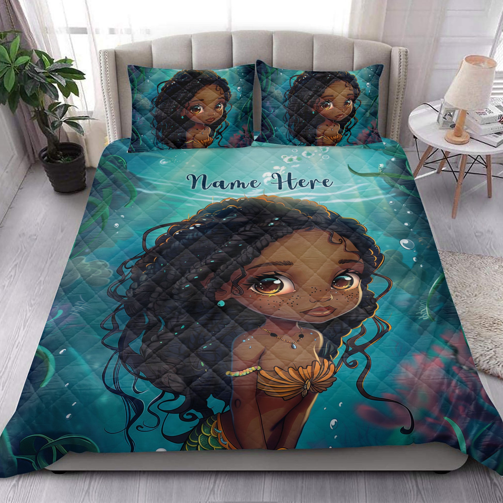Black African girl quilt bedding displayed in a bright bedroom with teal aquatic decor