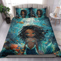 Black African girl mermaid quilt blanket styled on a bright bedroom with matching underwater artwork