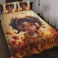 Black African girl wearing headphones on a floral quilt blanket displayed on a bedroom bed