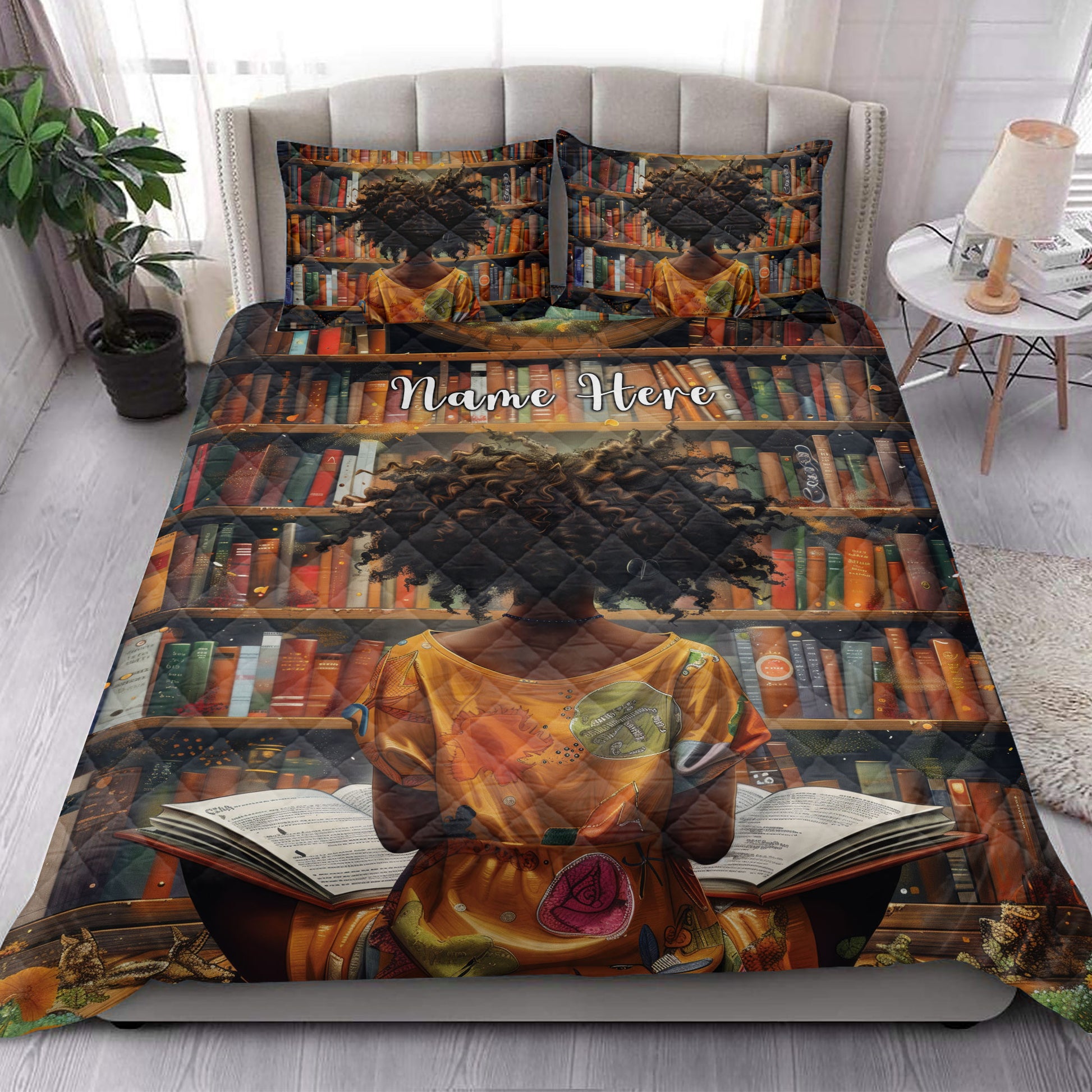 Black African girl quilt bedding styled in a bright bedroom with matching book-themed pillows and warm artwork