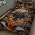 Book-themed Black African girl quilt blanket displayed across a bed with colorful books and open-book illustrations