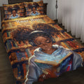 Black African girl reading with headphones on a library-themed quilt blanket displayed on a bed