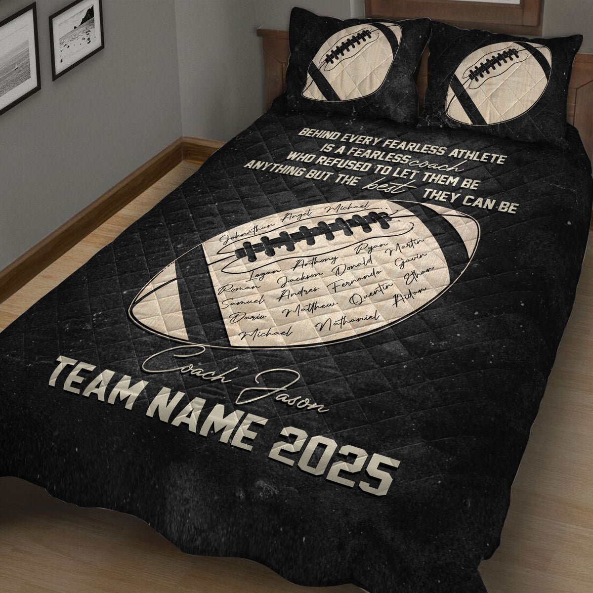 Black football quilt blanket displayed at an angle with football artwork and team-inspired design
