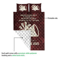 Red cheerleading quilt blanket showing printed front artwork and white quilted backing detail