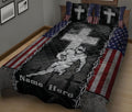 Football quilt blanket displayed on a bed with stars, stripes, crosses, and an American football player design