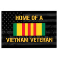 Vietnam Veteran doormat with patriotic stars, dark wood background, gold lettering, and red yellow green stripes