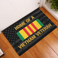 Vietnam Veteran door mat displayed at an entryway with a patriotic flag design and dark wood styling