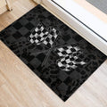 Checkered racing flag doormat positioned beside a bright interior doorway