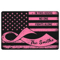 Black and pink breast cancer doormat featuring a ribbon, star pattern, and supportive entryway message