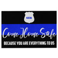Police doormat with a white badge, blue stripe, and heartfelt home entrance message on black