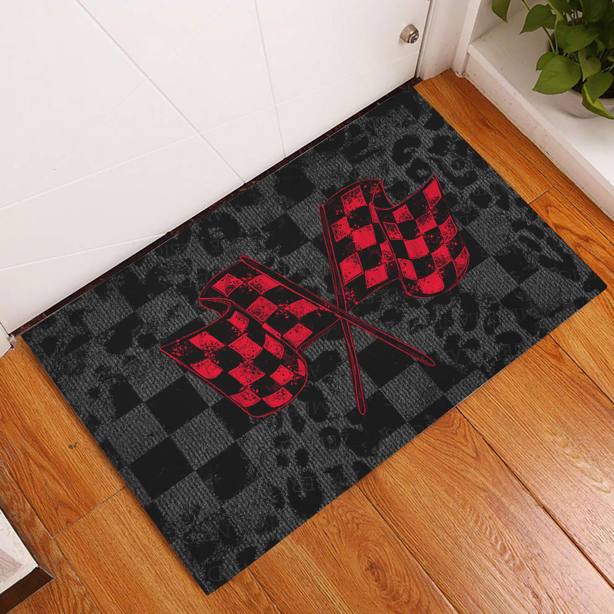 Racing-themed door mat with crossed red checkered flags displayed at a home entryway