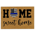 Tan police doormat featuring a badge with a blue line motif and bold welcome lettering