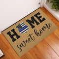 Police-themed welcome doormat displayed at a front door on a hardwood entryway floor