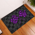 Racing doormat displayed at a front door with crossed purple checkered flags and black checkerboard artwork
