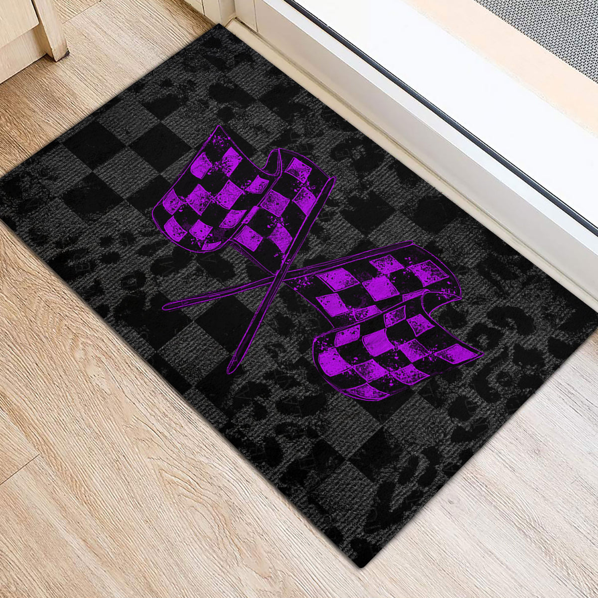 Black racing door mat with bold purple checkered flags shown in an indoor entryway