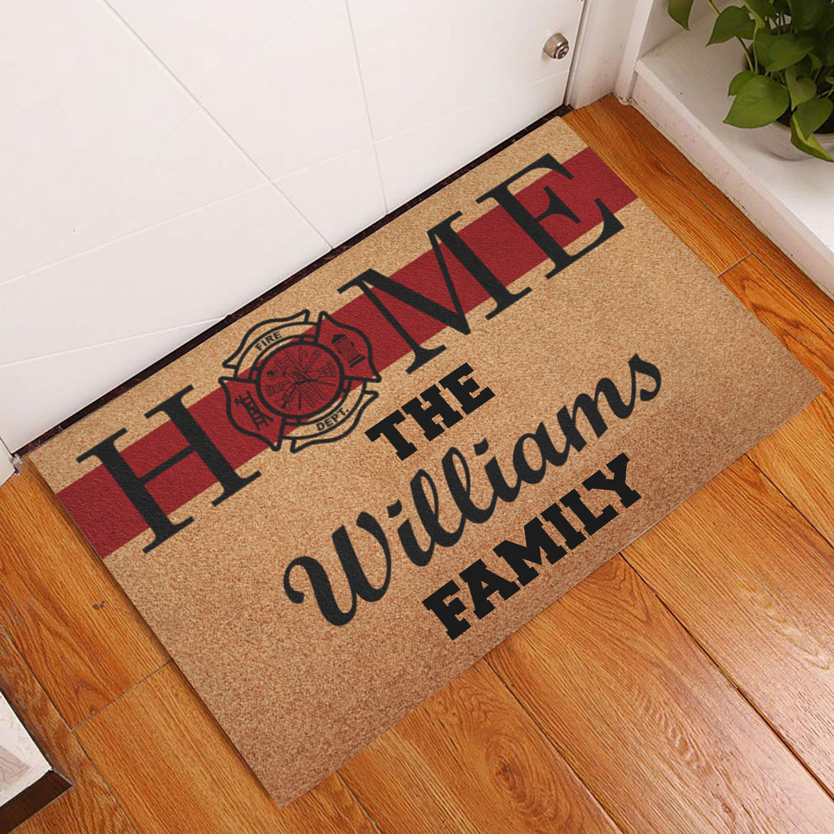 Firefighter-themed doormat displayed at an indoor entryway on warm wood flooring