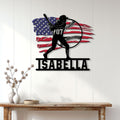 Softball wall decor displayed above a console table, featuring a batter silhouette and patriotic flag artwork
