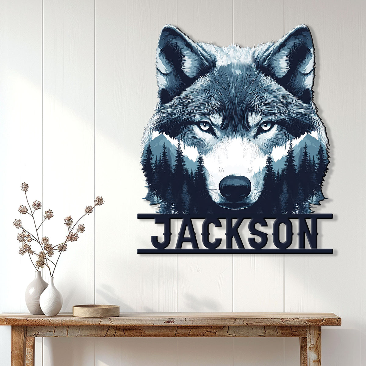 Wolf portrait metal wall sign displayed on a light wood-paneled wall above a console table