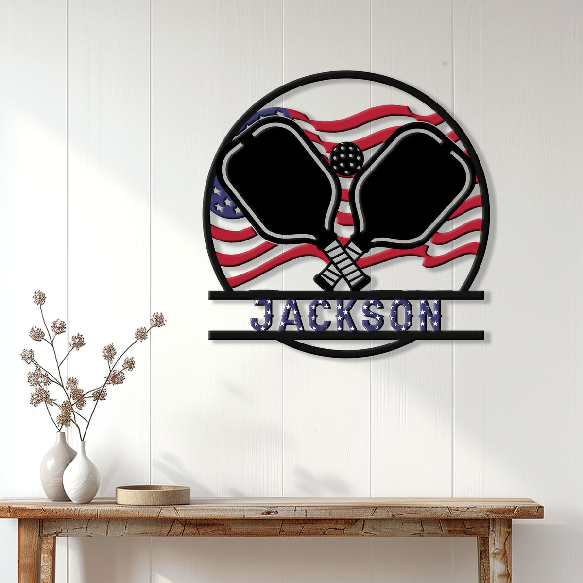 Patriotic pickleball wall sign displayed on a white paneled wall in a home decor setting