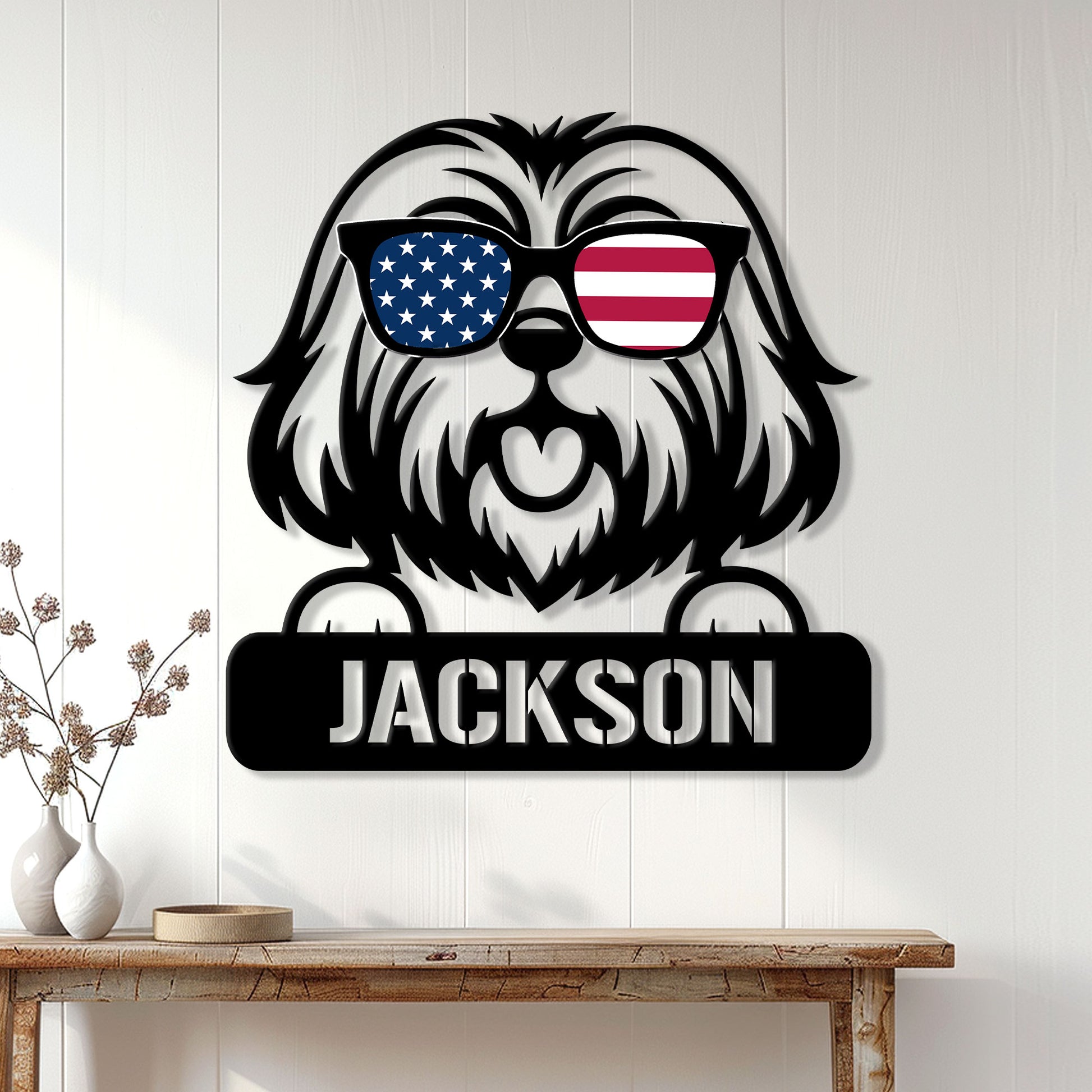Patriotic Lhasa Apso metal wall sign displayed on a white paneled wall above a wooden console