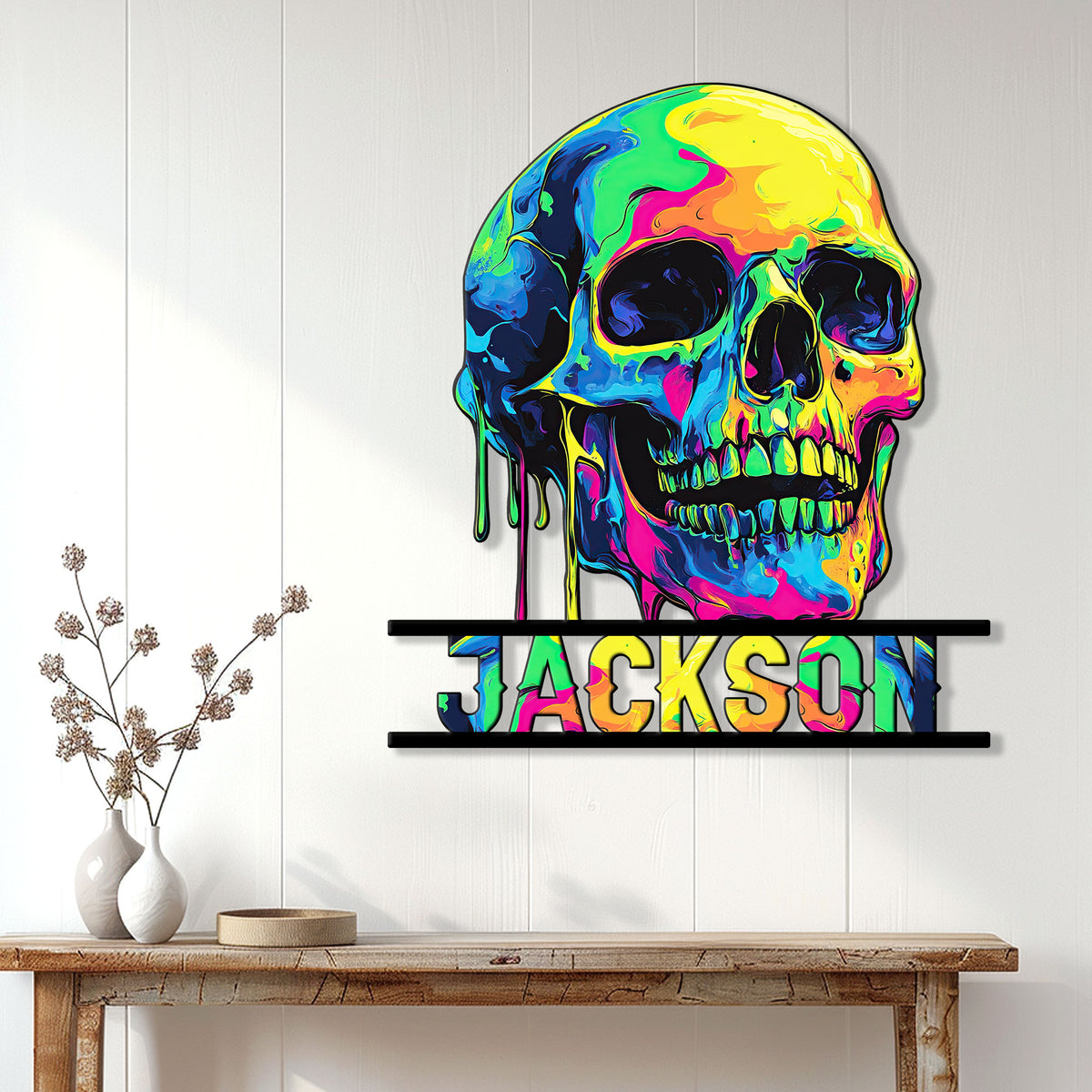 Vibrant skull wall sign displayed on a bright paneled wall above a console table