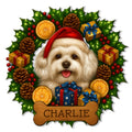 Custom Maltese metal sign featuring a cheerful dog in a Santa hat surrounded by holly, gifts, and pinecones