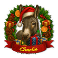 Christmas donkey metal sign featuring a Santa hat, holly, gifts, pinecones, and a festive red banner