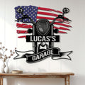 Biker garage wall decor displayed on white paneling above a console table with a motorcycle and flag design