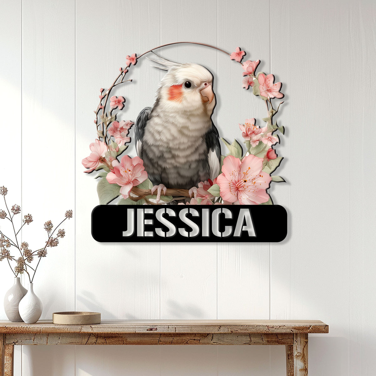 Floral cockatiel wall sign displayed above a console table in a bright modern home