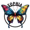 Colorful butterfly metal sign with vivid blue, pink, orange, and yellow wings in a circular design