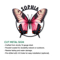 Pink butterfly cut metal sign shown with a clean view of its colorful wing design