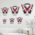 Butterfly metal sign shown in multiple sizes above a sofa for home decor scale reference