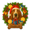Custom Christmas Basset Hound metal sign featuring a Santa hat, gifts, holly, pinecones, and a bone-shaped plaque