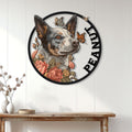Australian Cattle Dog wall sign displayed on white paneled decor above a wood console table
