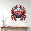 Vibrant crab metal wall decor displayed on a light paneled wall above a wood console table