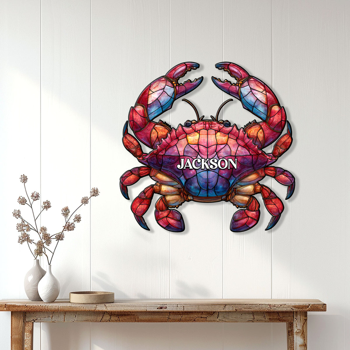 Vibrant crab metal wall decor displayed on a light paneled wall above a wood console table