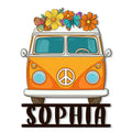 Colorful hippie van metal sign with flowers, butterflies, peace symbol, and bold retro boho styling