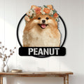 Floral Pomeranian metal sign displayed on a bright home entryway console