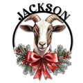 Goat metal sign featuring a detailed horned goat framed by evergreen branches and a red Christmas bow