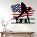 Patriotic pickleball wall sign displayed on a white paneled wall above a console table
