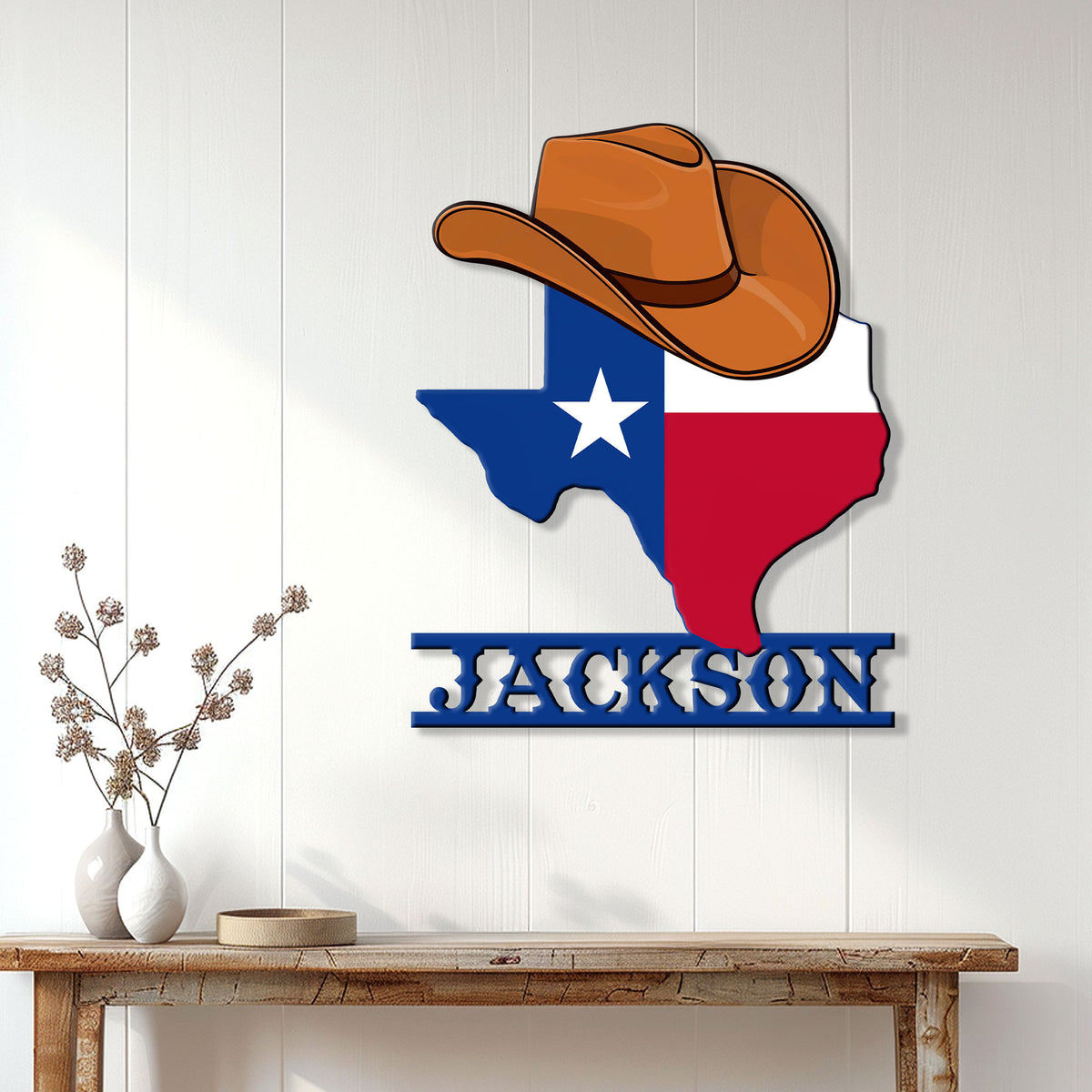 Texas cowboy hat wall decor displayed on a light wood-paneled wall in a home setting