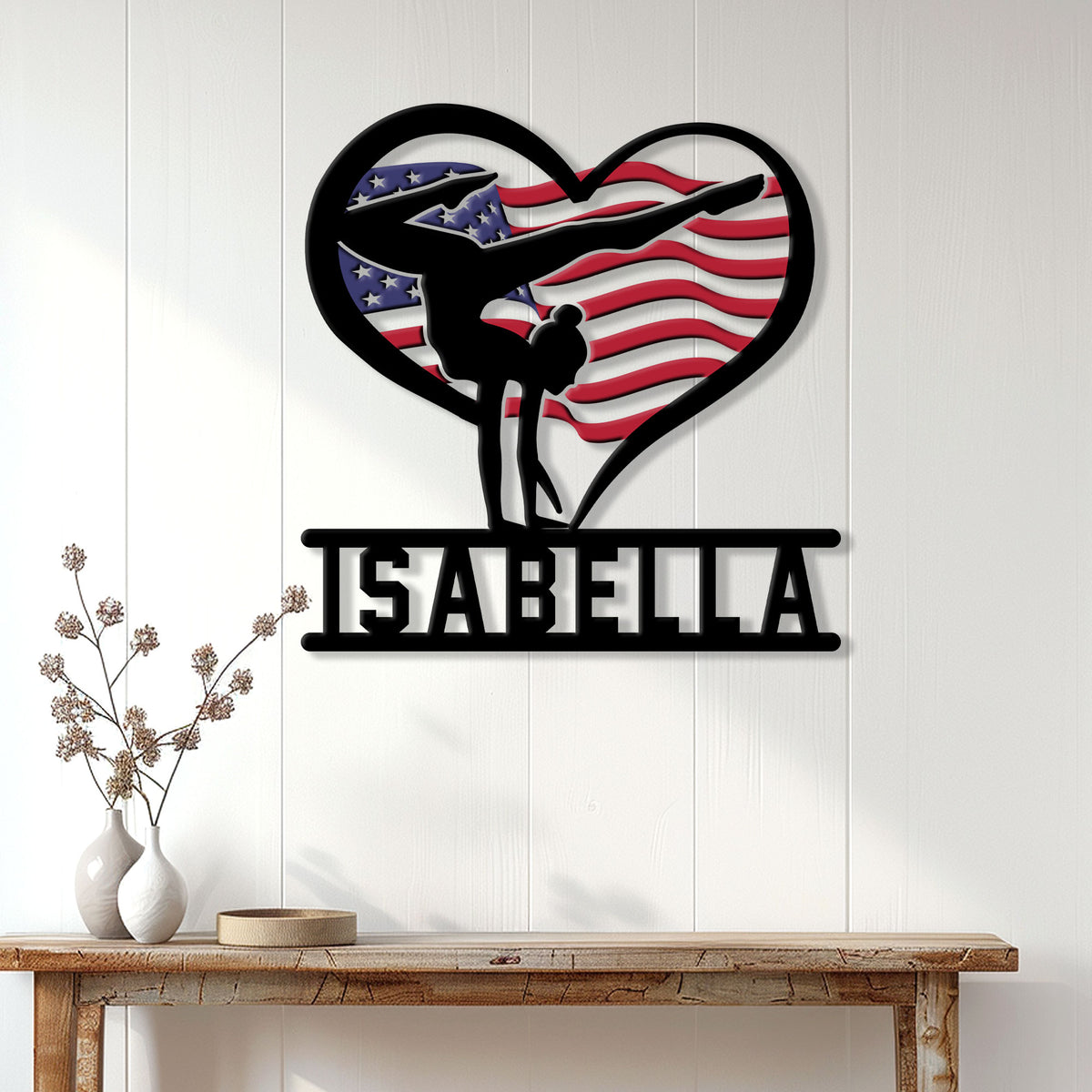 Custom gymnastics wall sign displayed on a bright paneled wall above a console table