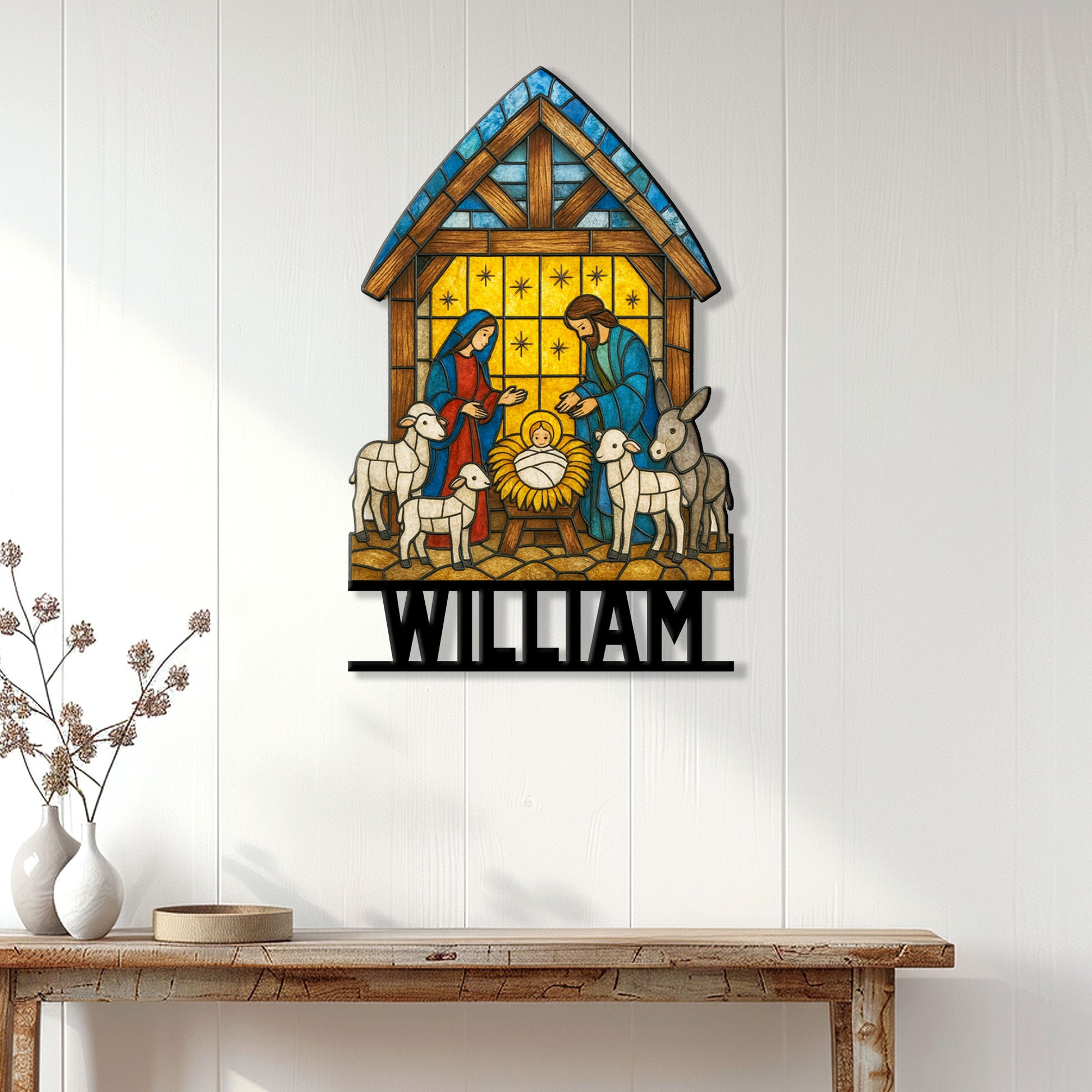 Christian nativity wall sign displayed on a white paneled wall above a wood console table