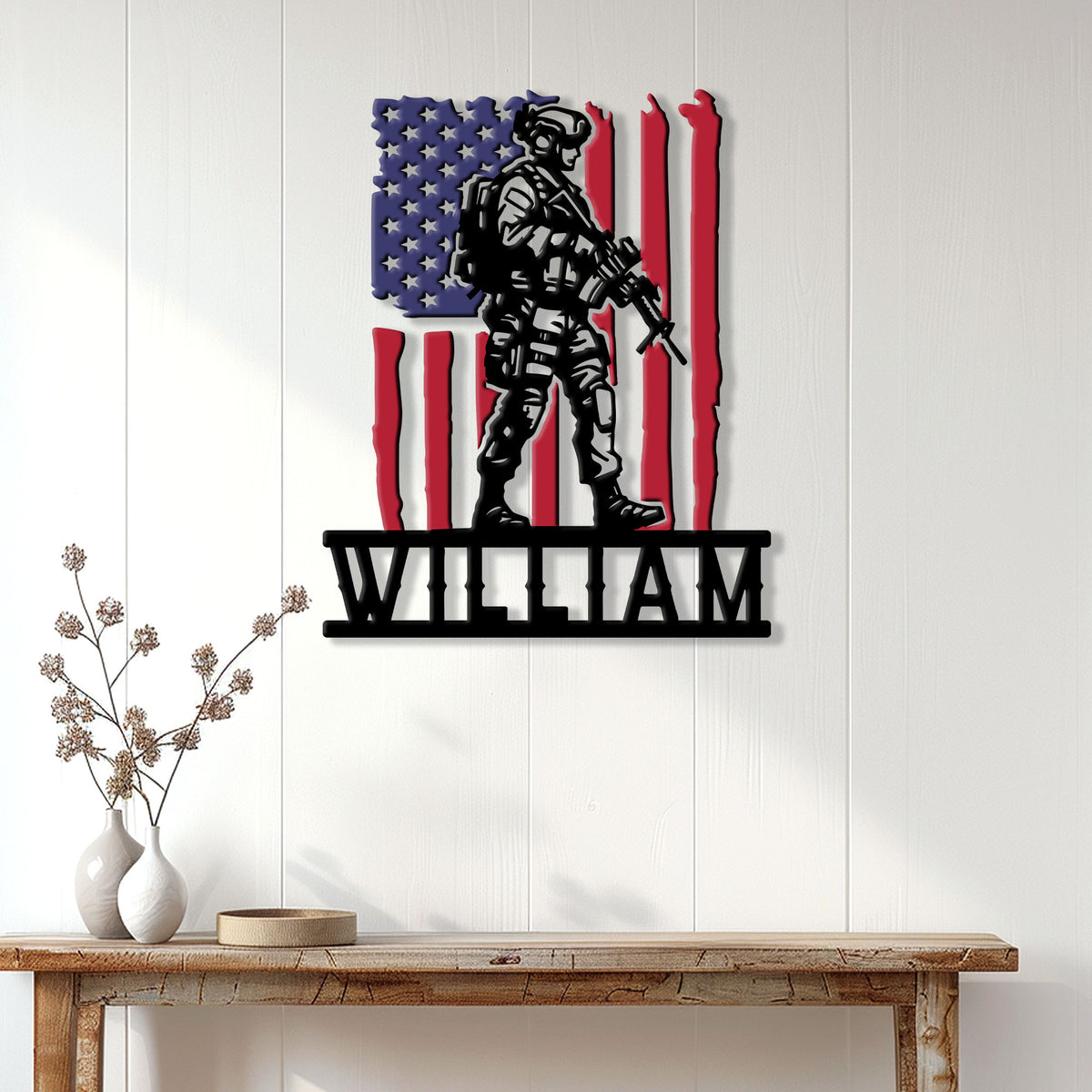 Veteran metal wall sign displayed on a bright wood-paneled wall above a console table