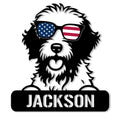 Aussiedoodle metal sign featuring a fluffy dog portrait wearing American flag sunglasses