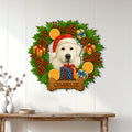 Great Pyrenees Christmas metal sign displayed on a white paneled wall above a wooden console table