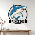 Custom shark wall sign displayed above a console table in a bright home interior