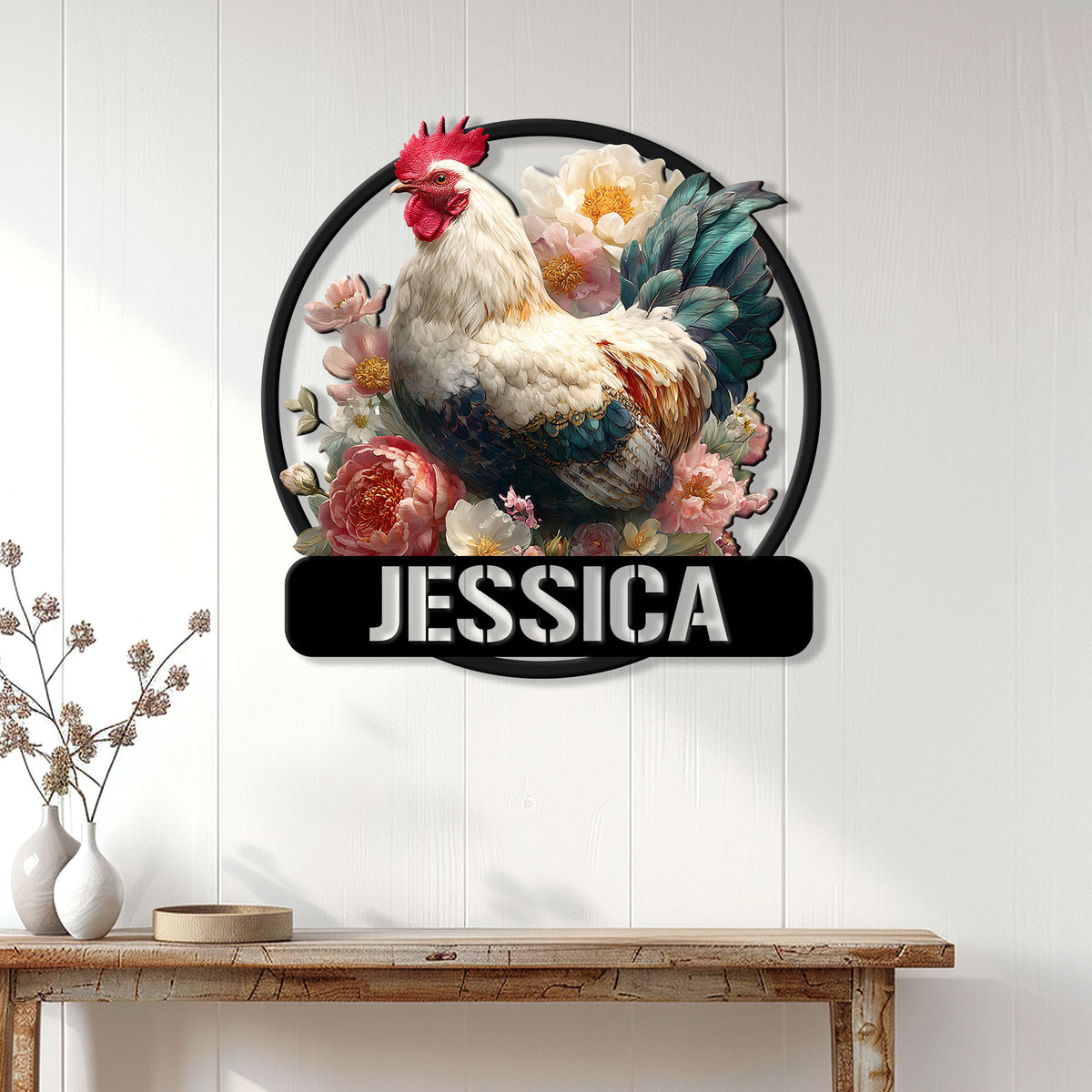 Floral rooster metal sign displayed on a white paneled wall above a wooden console table